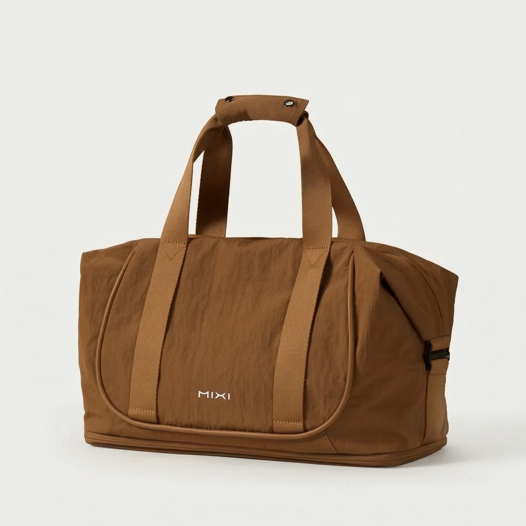 Women’s Duffle Bag with Luggage Sleeve & Top Handles | Travel