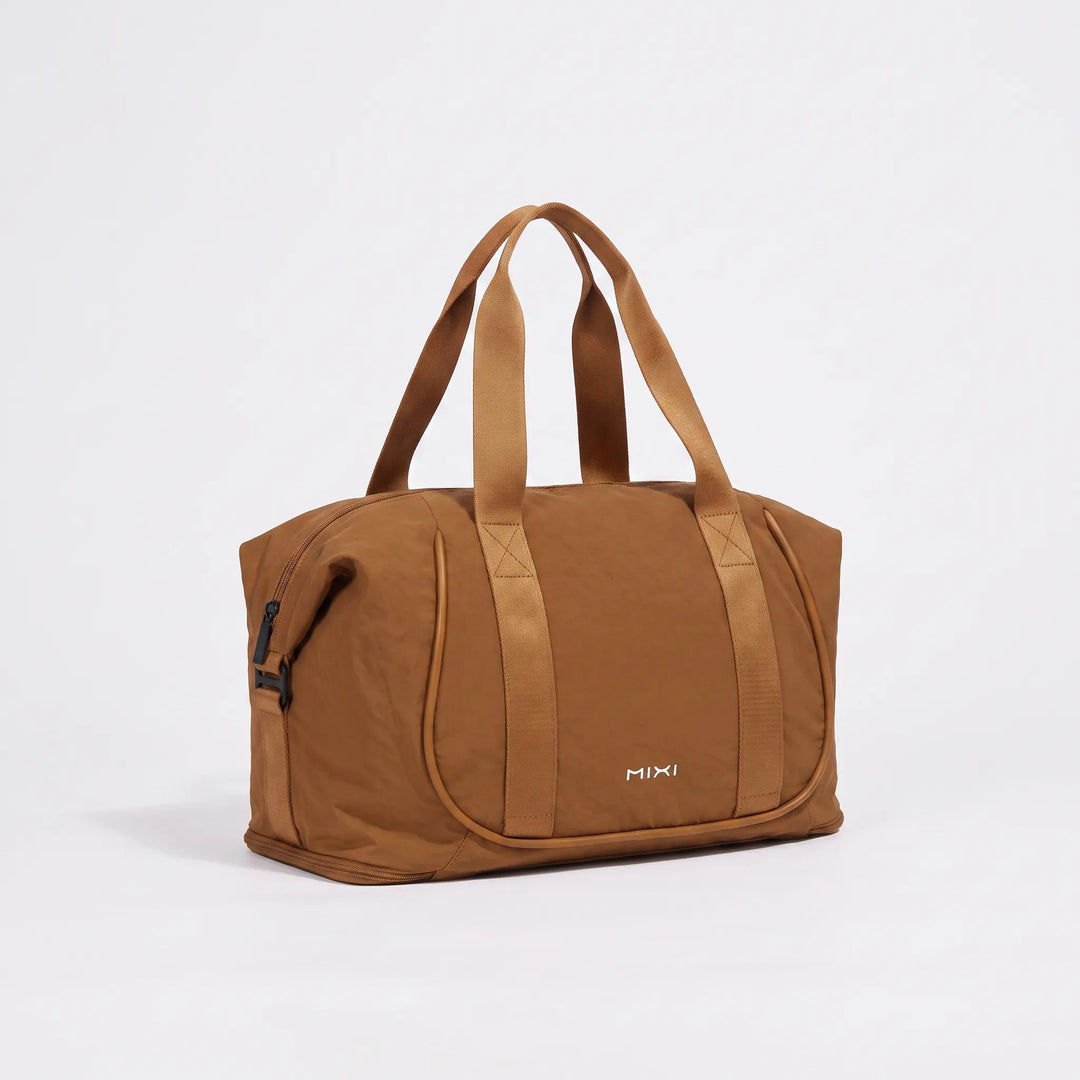 Women’s Duffle Bag with Luggage Sleeve & Top Handles | Travel