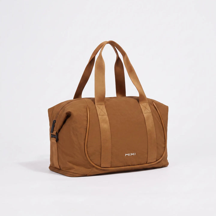 Women’s Duffle Bag with Luggage Sleeve & Top Handles | Travel