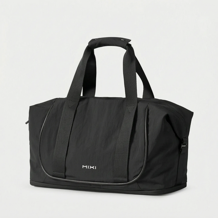 Women’s Duffle Bag with Luggage Sleeve & Top Handles | Travel