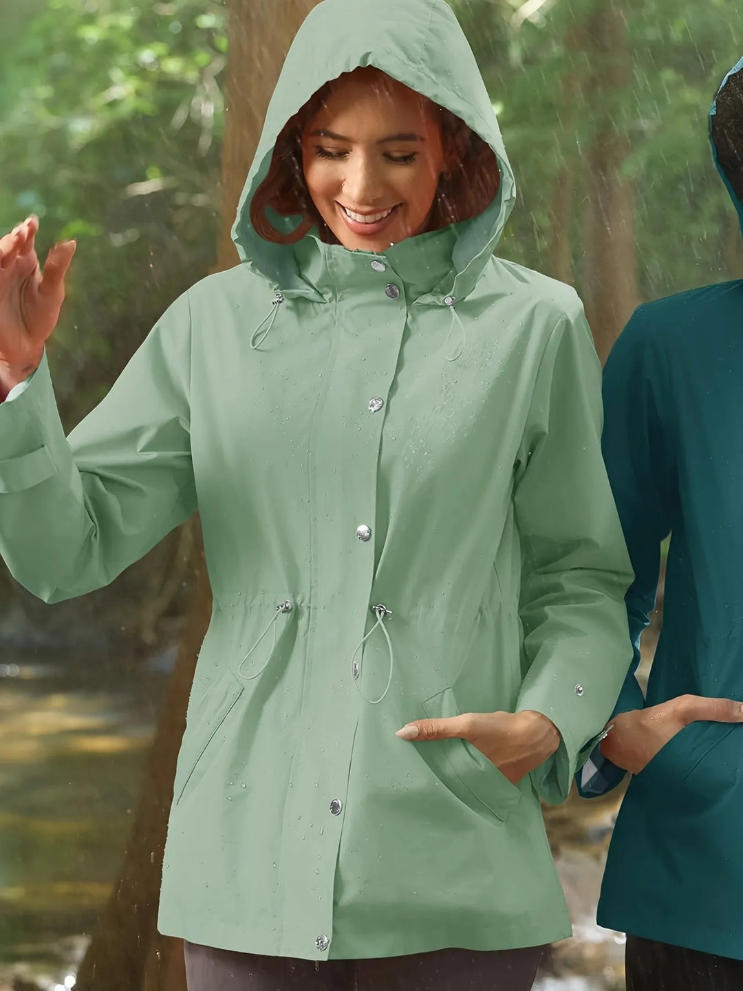 Women's Rain Jacket with Drawstring Waist & Hooded Design | Snap Front